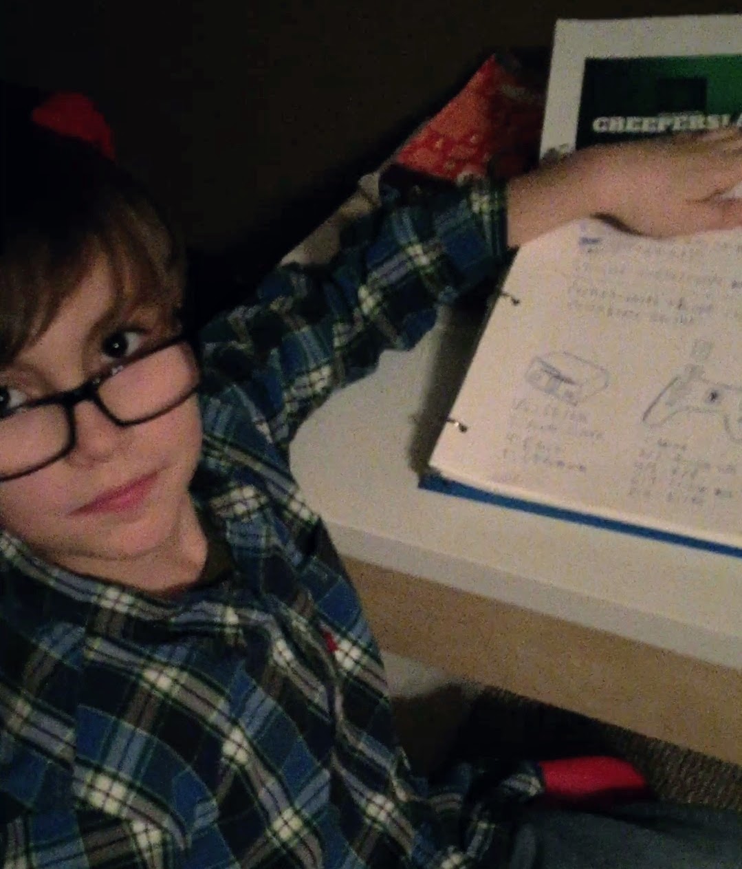 Adrian Lloyd at 11 years old, explaining a game he had designed.